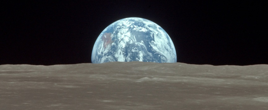The view from the Apollo 11 Command and Service Module (CSM) Columbia shows the Earth rising above the Moon's horizon on July 20th 1969.jpg